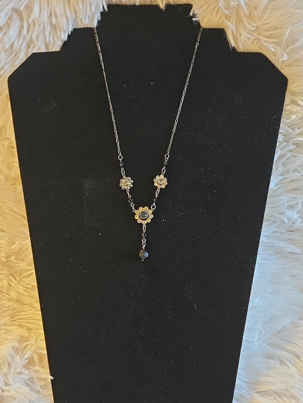 Delicate Gold Floral Necklace with Black Accent